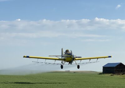 Tarrickfic Aerial plane spraying a field